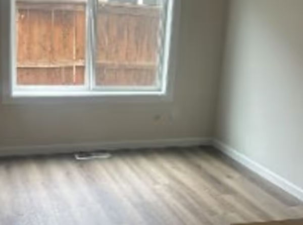 Bright resident bedroom with large window