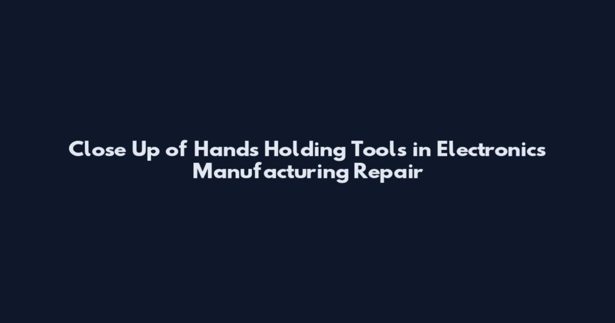 Close Up of Hands Holding Tools in Electronics Manufacturing Repair