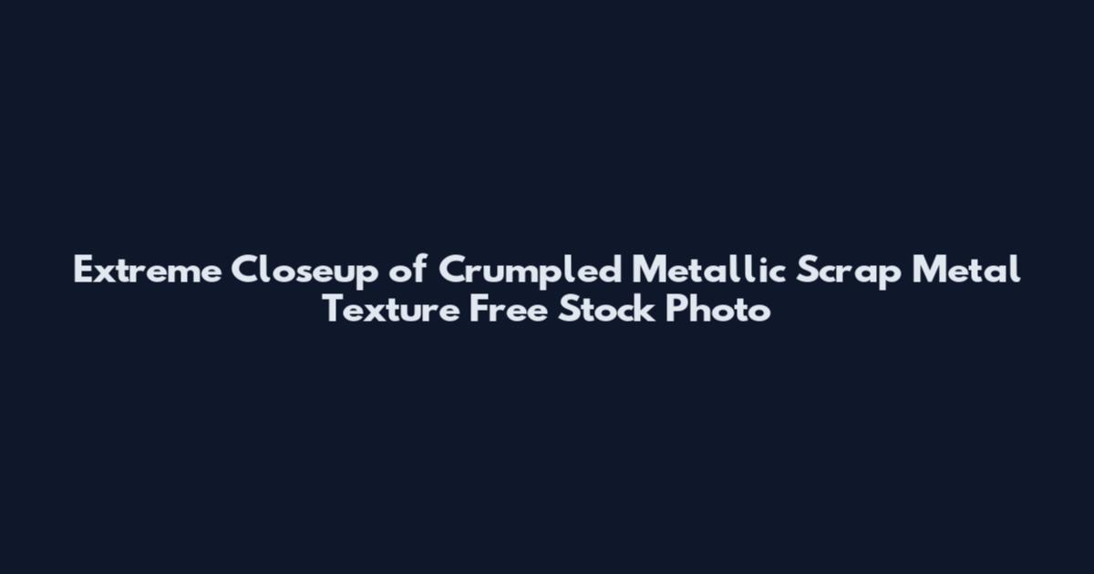 Extreme Closeup of Crumpled Metallic Scrap Metal Texture Free Stock Photo