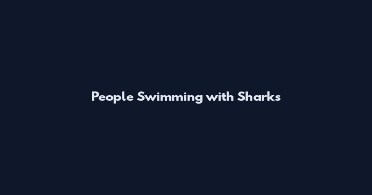 People Swimming with Sharks