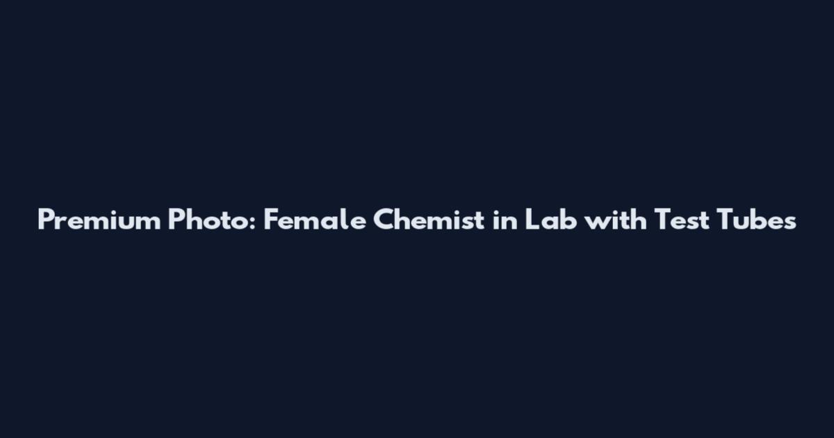 Premium Photo: Female Chemist in Lab with Test Tubes
