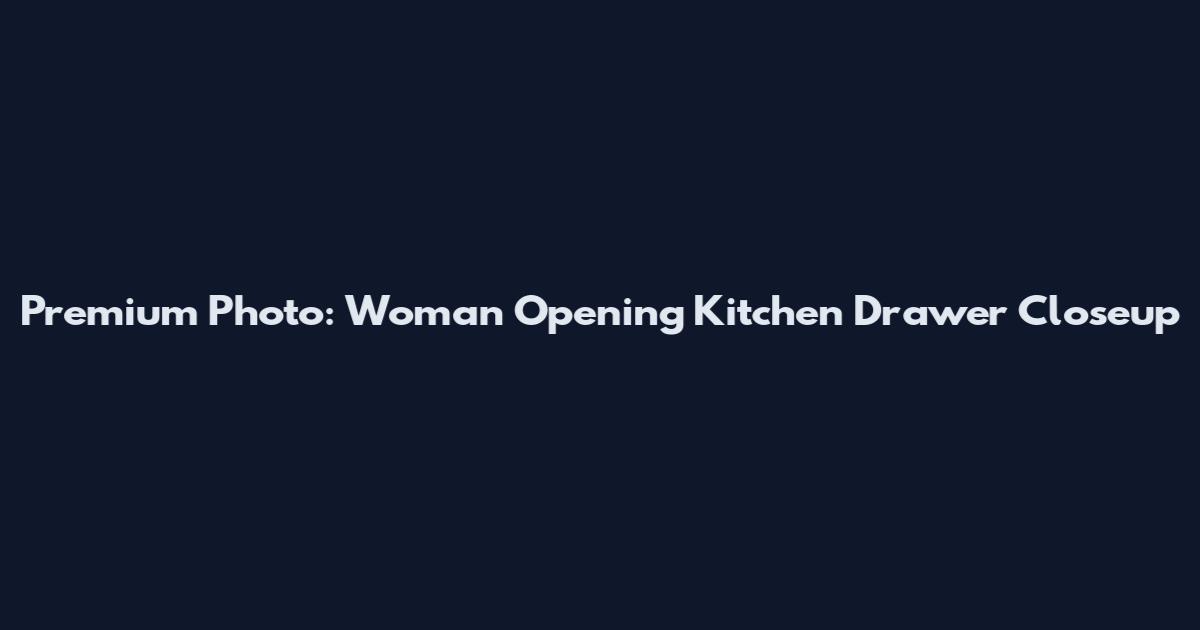Premium Photo: Woman Opening Kitchen Drawer Closeup