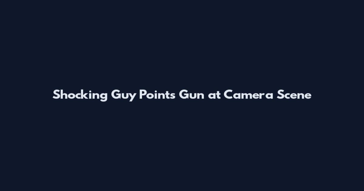 Shocking Guy Points Gun at Camera Scene